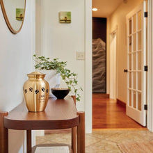 Load image into Gallery viewer, Small/Keepsake Gold Brass Paw Print Cremation Urn, 40 cubic inches