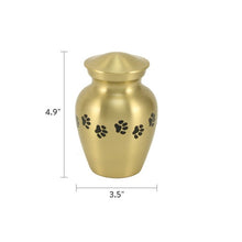 Load image into Gallery viewer, Small/keepsake Gold Brass Paw Print Cremation Urn, 25 cubic inches
