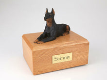 Load image into Gallery viewer, Doberman Black Laying Pet Funeral Cremation Urn Avail in 3 Dif Colors &amp; 4 Sizes
