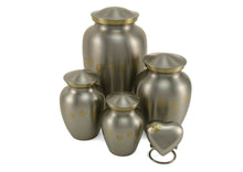 Load image into Gallery viewer, Small/Keepsake Pewter Brass Paw Print Cremation Urn, 25 cubic inches
